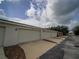 Multiple attached garages, with well maintained exterior, provide ample parking at 7462 Bentonshire Ave, Windermere, FL 34786