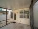 Screened-in patio provides outdoor access and versatile space for relaxation or entertainment at 7462 Bentonshire Ave, Windermere, FL 34786