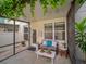Charming screened patio featuring ample seating, stylish décor, and refreshing outdoor ambiance at 7462 Bentonshire Ave, Windermere, FL 34786