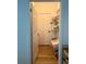 Walk-in closet featuring plastic shelving for organized storage at 8010 Tuscany Way # 3102, Davenport, FL 33896