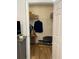 Walk-in closet featuring wire shelving and hardwood floors for organized storage at 8010 Tuscany Way # 3102, Davenport, FL 33896