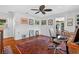 Bright office space with hardwood floors, ceiling fan, and neutral wall color at 815 E 11Th Ave, Mount Dora, FL 32757
