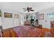 Bright office space with hardwood floors, ceiling fan, and neutral wall color at 815 E 11Th Ave, Mount Dora, FL 32757