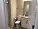 Clean bathroom featuring a shower and a single sink vanity at 8934 Stinger Dr, Davenport, FL 33896