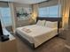 Comfortable bedroom with a queen-size bed and neutral colors at 8934 Stinger Dr, Davenport, FL 33896