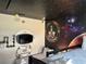 Whimsical space-themed bedroom with bunk beds and creative wall art, perfect for  at 8934 Stinger Dr, Davenport, FL 33896