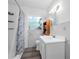 Bathroom featuring new vanity, updated fixtures, and shower; providing comfort and style at 905 Flewelling Ave, Ocoee, FL 34761