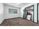 Functional bedroom with a window and closet that provides a basic, private area with room for personalization at 905 Flewelling Ave, Ocoee, FL 34761