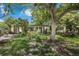 Charming single-story home with mature trees and a well-maintained lawn at 905 Flewelling Ave, Ocoee, FL 34761