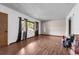 Bright living room with hardwood floors and natural light at 905 Flewelling Ave, Ocoee, FL 34761