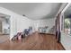 Spacious living room features beautiful floors and ample natural light at 905 Flewelling Ave, Ocoee, FL 34761