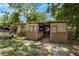 Exterior of backyard shed with sliding door at 905 Flewelling Ave, Ocoee, FL 34761