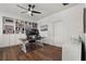 Bright office with built-in bookcases, a modern desk, and natural light at 922 Grazie Loop, Davenport, FL 33837