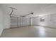 Spacious garage with overhead door, window and smooth flooring at 1011 W 13Th St, Lakeland, FL 33805