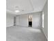 Relaxing main bedroom includes an ensuite bathroom and modern lighting at 1159 Mountain Flower Ln, Davenport, FL 33837