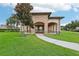Beautiful outdoor gazebo with stone accents and a serene setting, ideal for gatherings and relaxation at 13232 Alderley Dr, Orlando, FL 32832