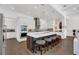 Gourmet kitchen boasts stainless steel appliances and a large center island with seating at 13232 Alderley Dr, Orlando, FL 32832