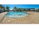 Bright splash pad with playful water features, colorful decor, and palm tree accents at 13232 Alderley Dr, Orlando, FL 32832
