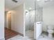 Contemporary bathroom with a walk-in shower, modern fixtures, and stylish tile work, offering a clean and sophisticated design at 13735 Sw 73Rd St, Ocala, FL 34481