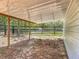 Covered outdoor patio with a view of the property and fence at 13735 Sw 73Rd St, Ocala, FL 34481
