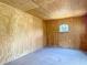 Interior view of shed with plywood walls, concrete floors, and natural light at 13735 Sw 73Rd St, Ocala, FL 34481