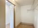 Empty walk-in closet with wood floors and basic wire shelving, ready for customization at 13735 Sw 73Rd St, Ocala, FL 34481