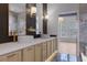 Well-appointed bathroom with dual sinks, and designer fixtures at 1400 Celebration Ave # 203, Celebration, FL 34747