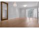 Spacious living room featuring hardwood floors, neutral walls, and lots of natural light at 1400 Celebration Ave # 203, Celebration, FL 34747