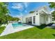 Beautiful home showcasing a pool, and a seamless transition to outdoor living, blending luxury and relaxation at 1820 Glencoe Rd, Winter Park, FL 32789