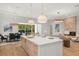 Spacious kitchen island with quartz countertop and copper hardware at 1820 Glencoe Rd, Winter Park, FL 32789
