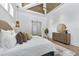 Relaxing main bedroom featuring a neutral color palette, stylish furnishings, and wood-accented ceiling at 1820 Glencoe Rd, Winter Park, FL 32789