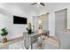 Stylish home office featuring a modern desk, neutral color palette, and elegant decor at 1820 Glencoe Rd, Winter Park, FL 32789