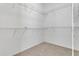 Spacious walk-in closet with shelving provides ample storage space, perfect for organizing clothes and accessories at 19554 Spring Oak Dr, Eustis, FL 32736