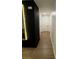 Bright hallway features wood-look floors and a stylish accent wall at 1982 King Ranch St, Kissimmee, FL 34744