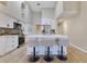Beautiful kitchen offers stainless appliances, an island with barstools and plenty of counter space to cook and entertain at 2024 Flaming Arrow Ct, Fern Park, FL 32730