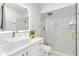 Sleek bathroom with quartz countertops, elegant square sink, and glass-enclosed shower at 205 Stevenage Dr, Longwood, FL 32779