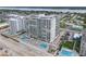 Beautiful beachfront condo with an aerial view of pools, balconies, and stunning coastline scenery at 2055 S Atlantic Ave # 1410, Daytona Beach Shores, FL 32118
