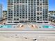 Striking high-rise building boasting numerous balconies with ocean views and convenient beach access at 2055 S Atlantic Ave # 1410, Daytona Beach Shores, FL 32118