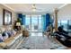 Comfortable living room with ocean views, ample seating, and bright interior at 2055 S Atlantic Ave # 1410, Daytona Beach Shores, FL 32118