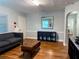 Comfortable living room with natural light, hardwood floors, and modern furnishings at 2515 Marlboro St, Orlando, FL 32806