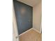 Small laundry room featuring tile floors and painted walls at 2817 Moultrie Creek Dr, Kissimmee, FL 34743