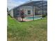 Enjoy outdoor living with a screened-in pool in the backyard at 2817 Moultrie Creek Dr, Kissimmee, FL 34743