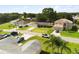 Aerial view of the home showcasing the location of the property and well manicured lawn at 303 Mariana Way, Kissimmee, FL 34758