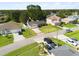 An aerial view of a residential neighborhood, showcasing the home's location and surrounding properties at 303 Mariana Way, Kissimmee, FL 34758