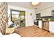 Bright kitchen with stainless steel appliances, stylish cabinetry, and a sliding glass door that enhances the view at 3519 Amigos Ave, Orlando, FL 32808
