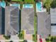 Bird's-eye view of homes with private pools and well-kept landscaping at 370 Pendant Ct, Kissimmee, FL 34747