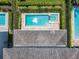 Aerial view of homes with swimming pools and lush landscaping in a well-maintained neighborhood at 370 Pendant Ct, Kissimmee, FL 34747