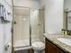 Bathroom featuring a shower, granite countertop, and tile floors at 370 Pendant Ct, Kissimmee, FL 34747