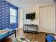 A bedroom is decorated with bright colors and themed bedding, creating a fun and playful atmosphere at 370 Pendant Ct, Kissimmee, FL 34747