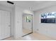 Bedroom featuring sliding glass door to closet and window view at 380 Violet Dell Dr, Casselberry, FL 32707